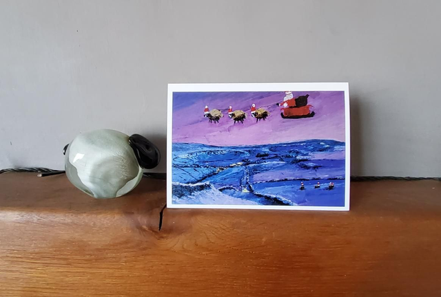 Father Christmas and his flying Sheep over the Roman Road above Bainbridge. A6 Christmas card. 