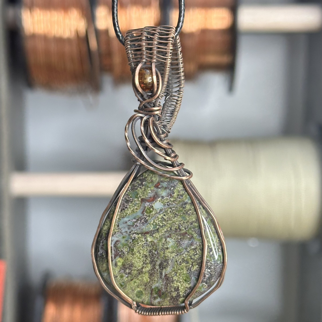 Dragons blood Jasper wrapped in pure copper pendant 