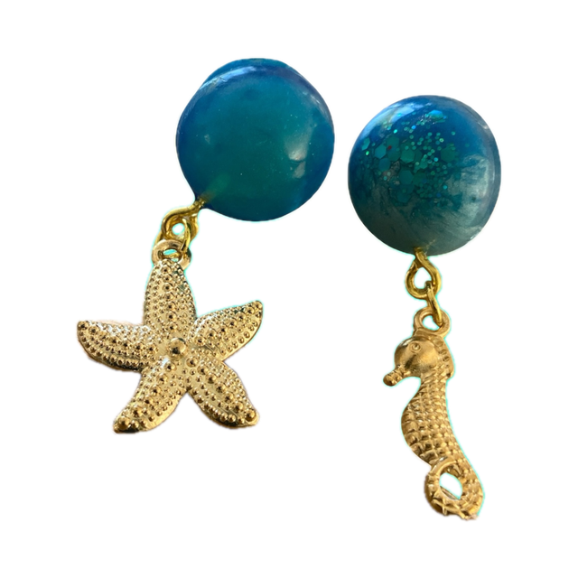 Les Boucles d'Oreilles de l'Onde Jumelle