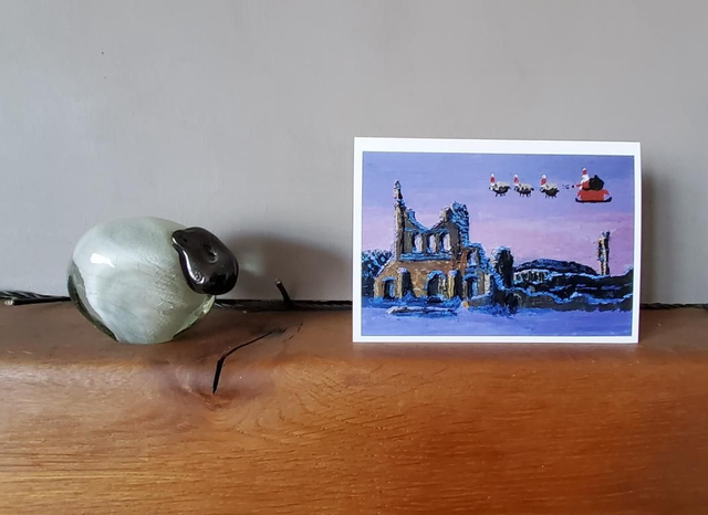 Father Christmas and his flying sheep over Byland Abbey. A6 card. 