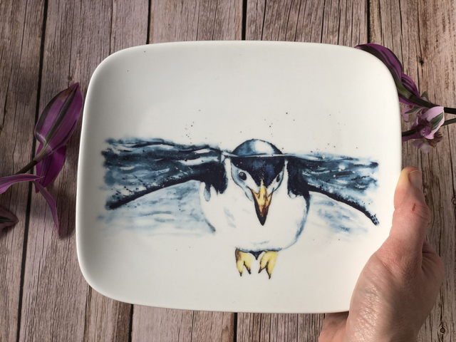 Swimming penguin upcycled plate