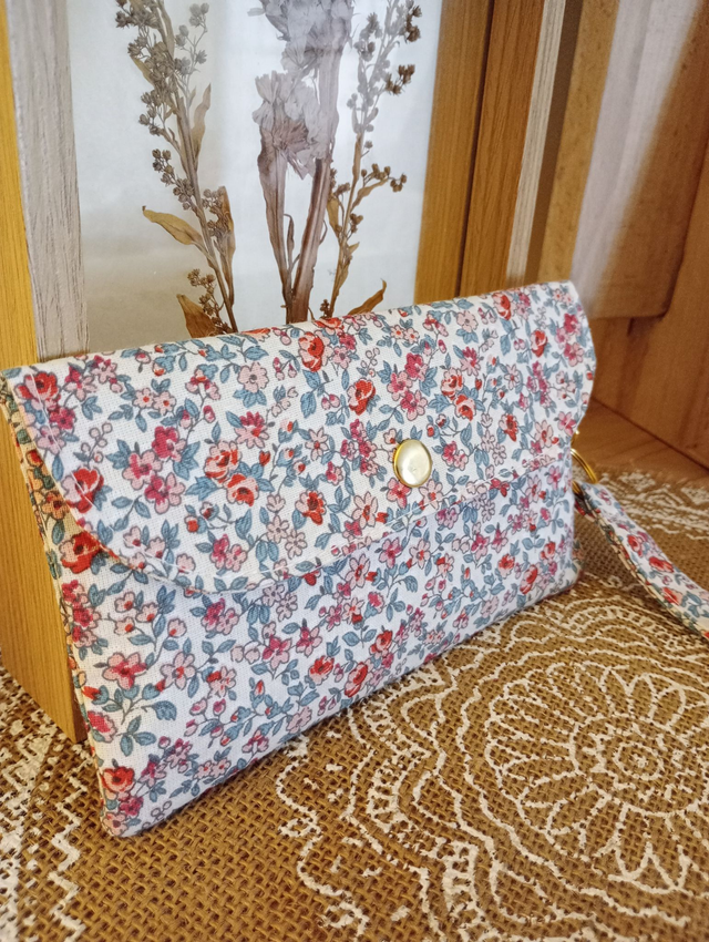 Pochette avec dragonne