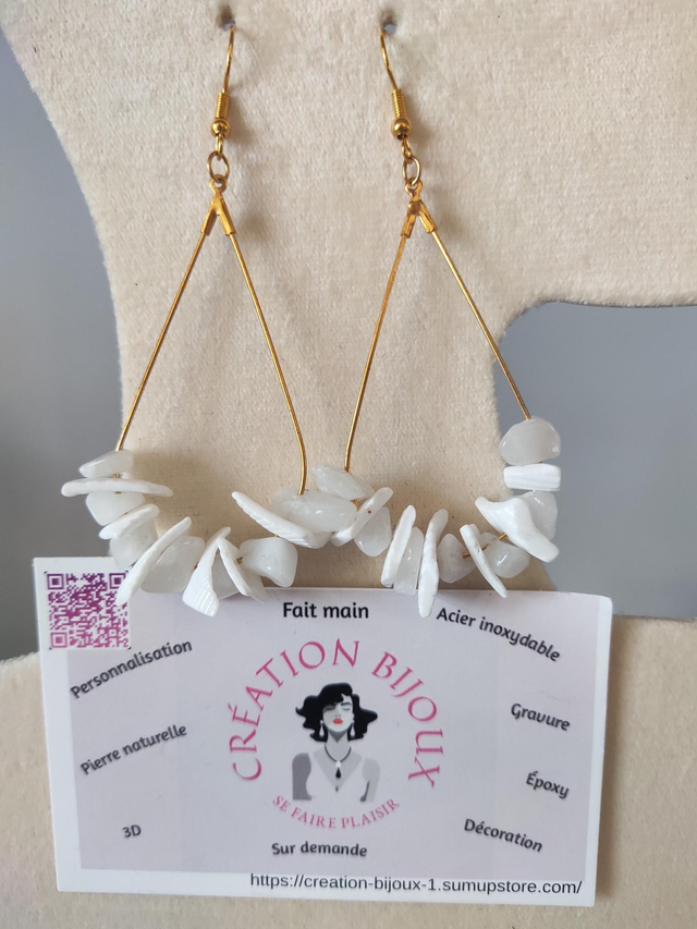 Boucle d'oreille avec perle et coquillage 