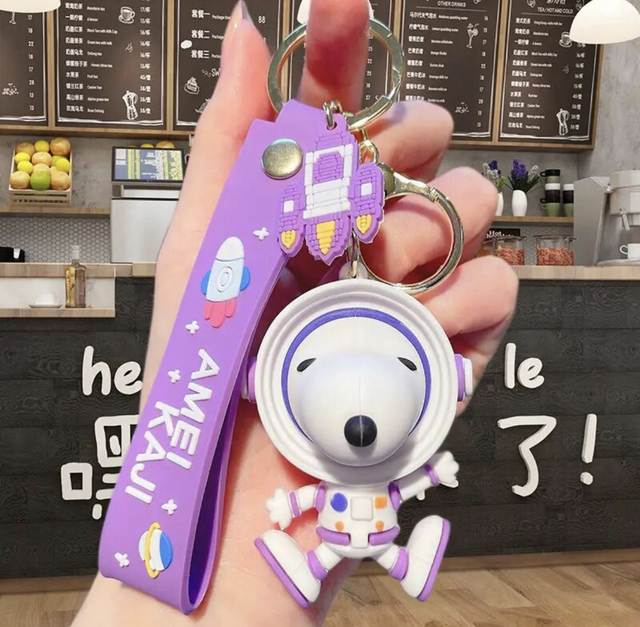 0337 - Peanuts - Snoopy als astronaut - paars