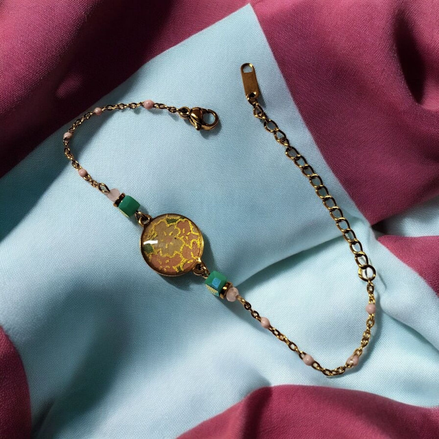 bracelet acier inoxydable motifs japonais rose et turquoise doré