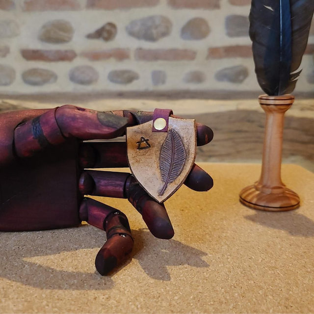 Porte-clefs "plume symbole de l'air"