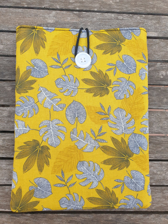 Funda de libro hojas fondo mostaza