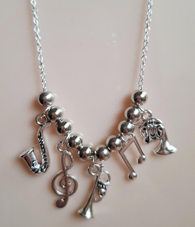 Music jazz themed charm necklace with 18 inch silver plated chain