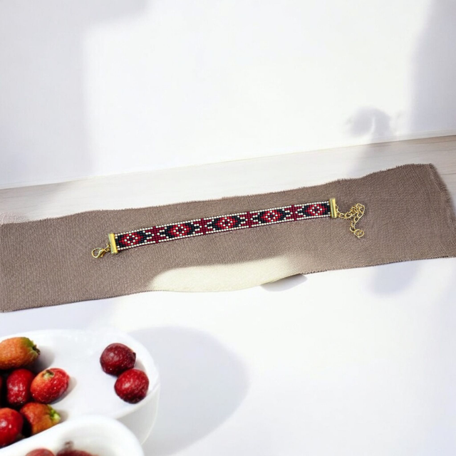 Bracelet fin tons rouge, noir et or