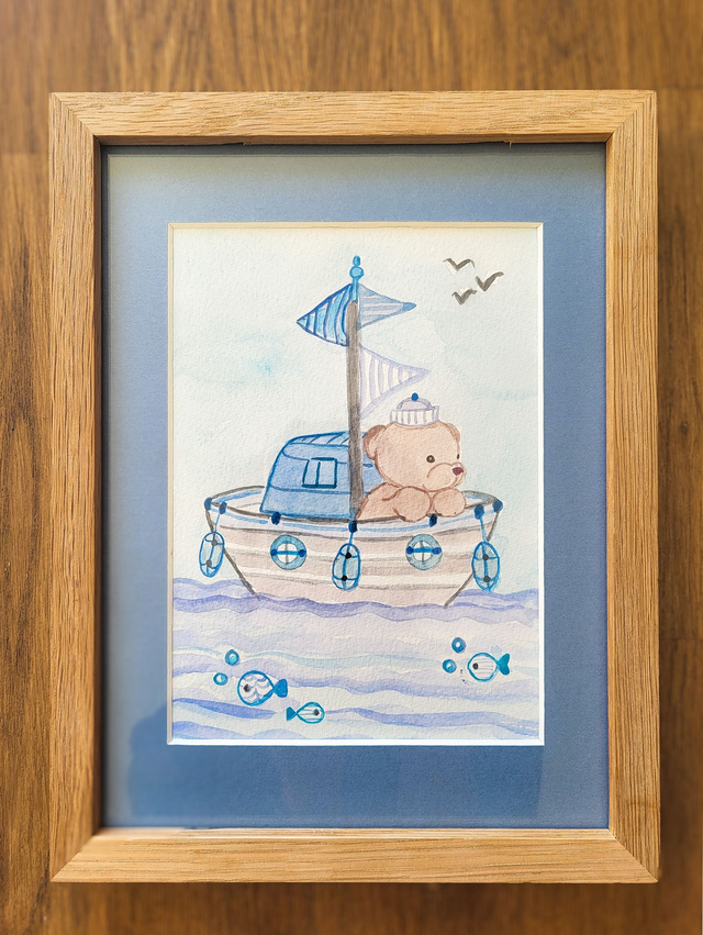 Petit ours sur son bateau