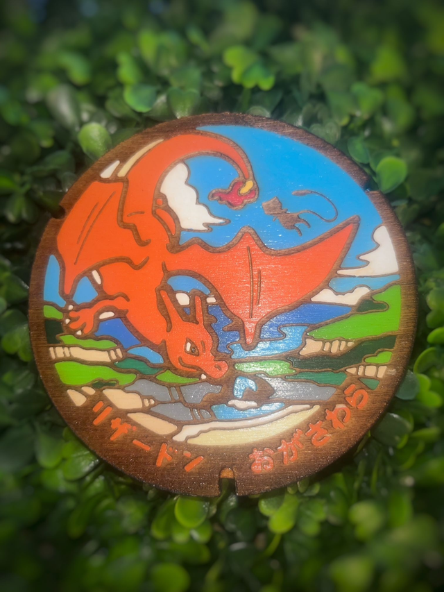 Plaque Pokémon dracaufeu.
