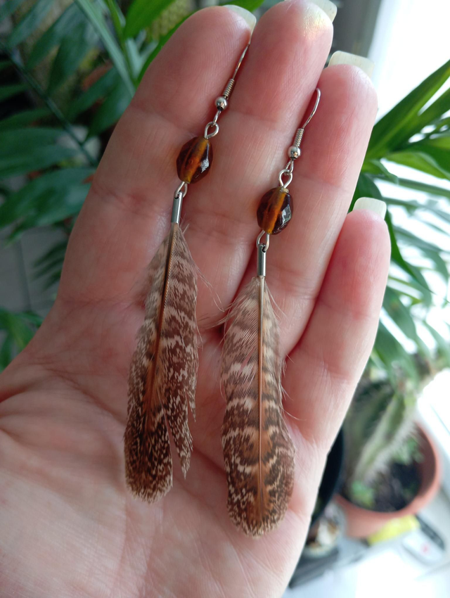 Boucles en plumes 