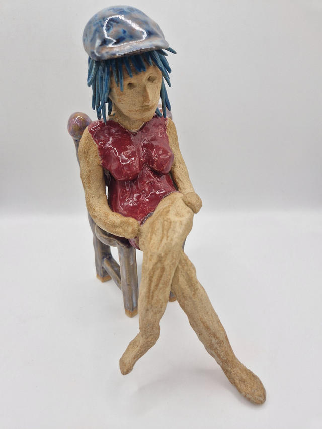 Lady sitting in Chair