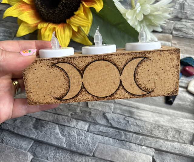 Triple moon tealight holder