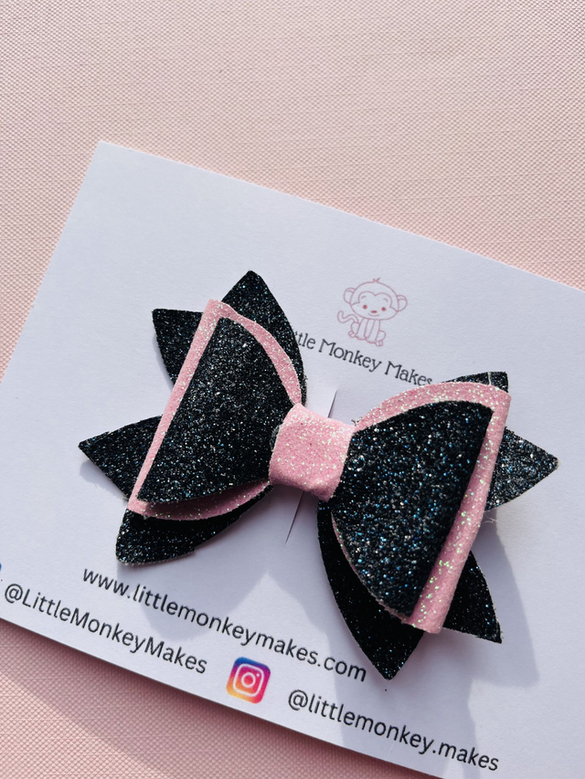 Black and pink glitter bow