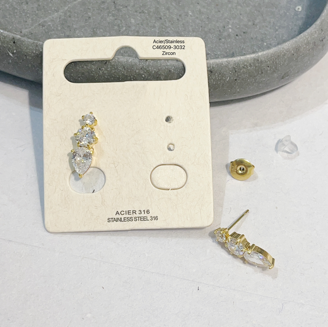 Boucle triple strass puce 