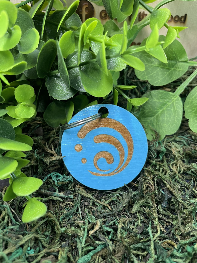 Porte clé Genshin Impact hydro en bois.