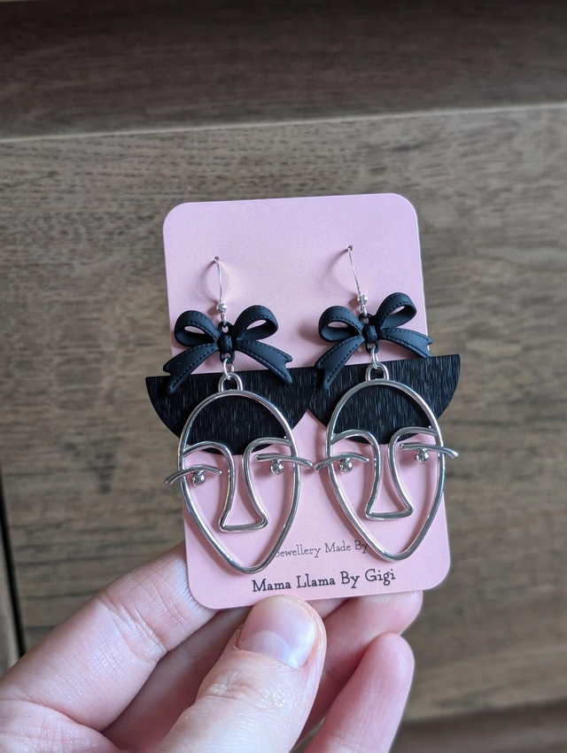 Girl in a bow earrings 