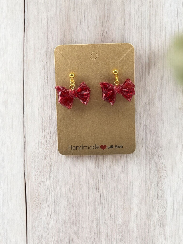 Boucles d'oreilles nœuds résine époxy