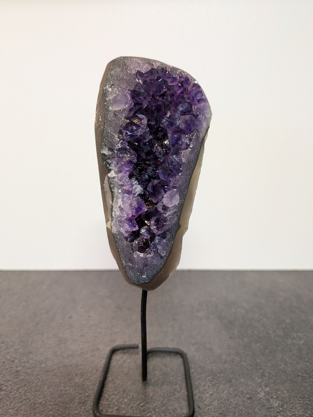 Amethyst cluster on a stand