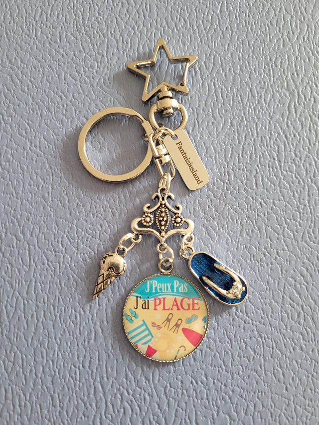 Accroch-clés argenté - J'peux pas j'ai Plage