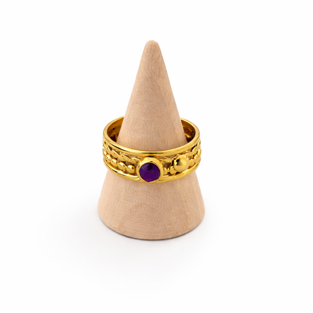 Anillo acero dorado morado 