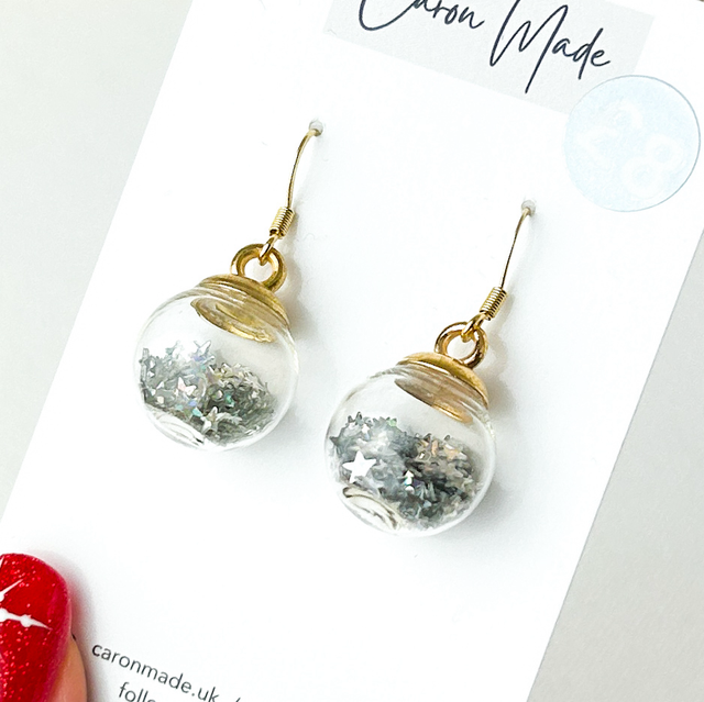 Bauble earrings with silver star glitter
