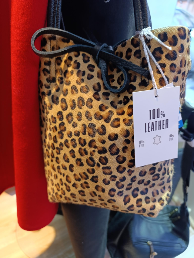 Bolso saquito piel animal print