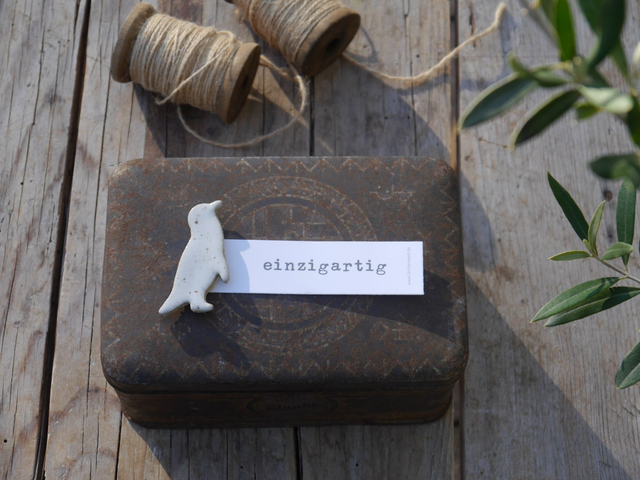 Pinguin mit Magnet und Banderole