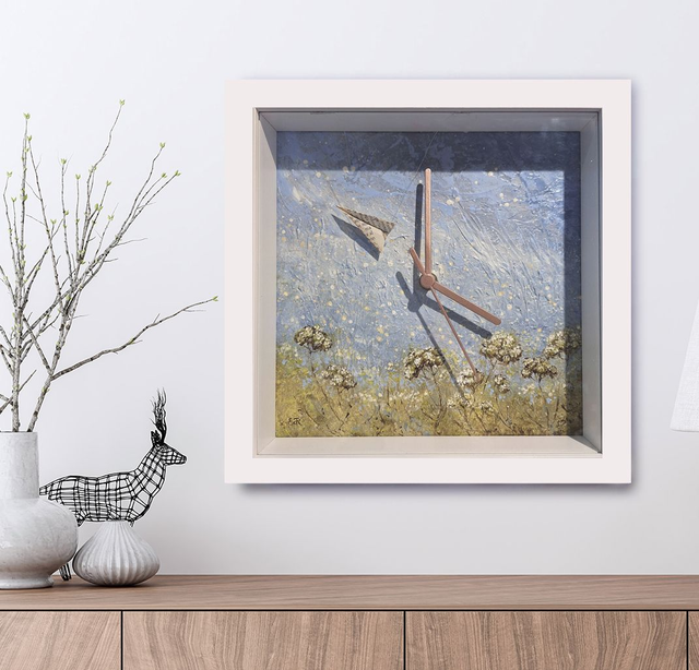 Orologio con aeroplanino