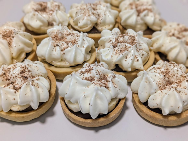 Mini Bannoffee tarts, batches of 24.Handmade pastry, caramel and Chantilly cream with a layer of banana 