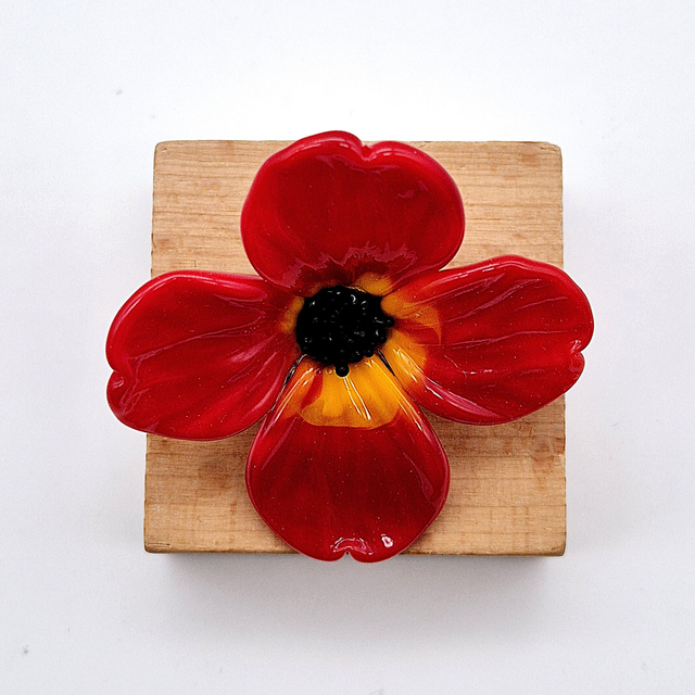 Pin's Fleur rouge et jaune