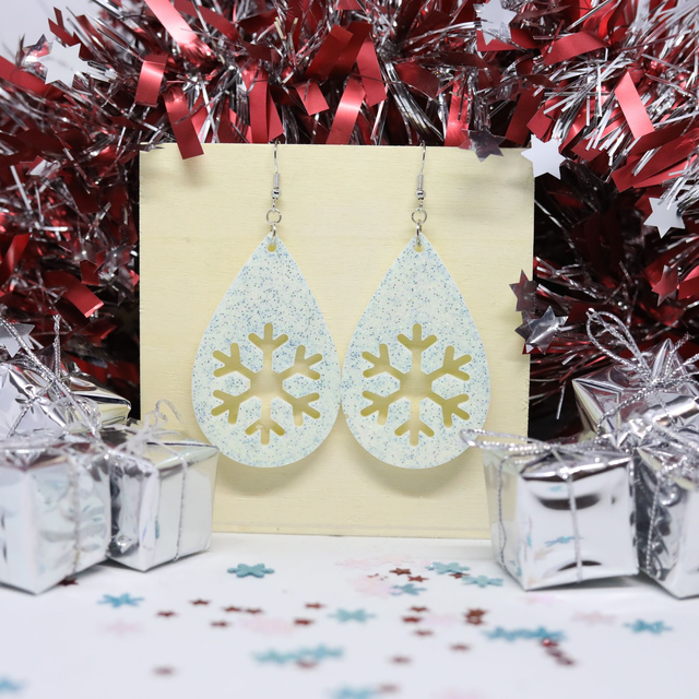 Boucles d&#039;oreilles goutte silhouette Flocon