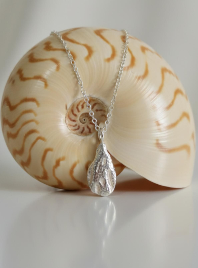 Dimpled Coral fragment necklace