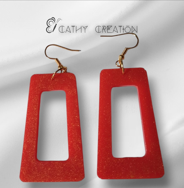 Boucles d'oreille rouge avec reflets dorés 