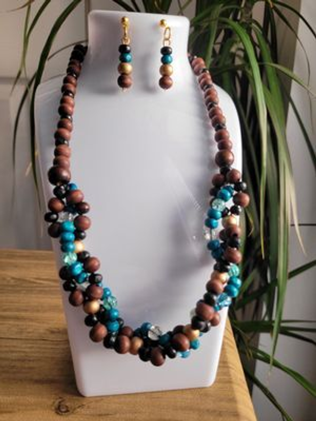 Matching brown, aqua and gold themed necklace and earrings