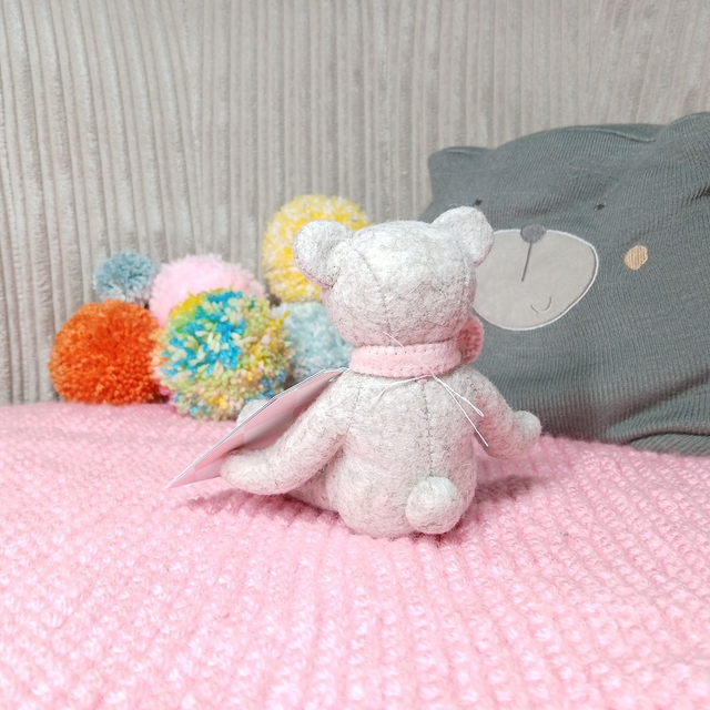 No name* traditional beige bear. Soft pink bow tie. Small size, handmade teddy bear. UKCA. Tray base. Standard Wool Felt. Beige. Cream. Blush. Pastel.