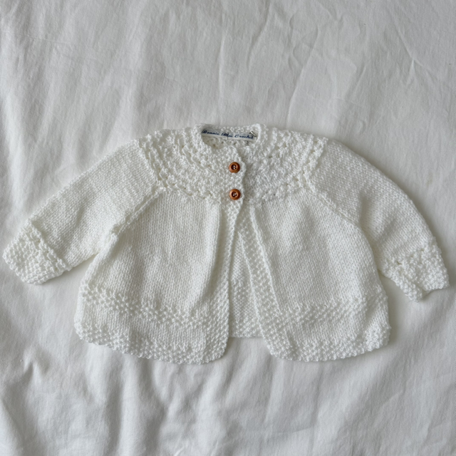 White knitted baby matinee jacket