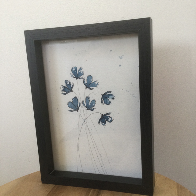 Cadre fleurs bleues à l’aquarelle 