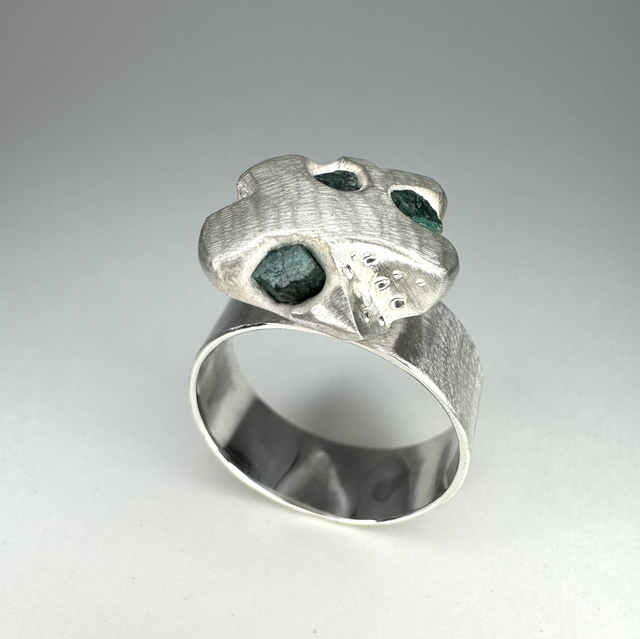 Cast emeralds band 1