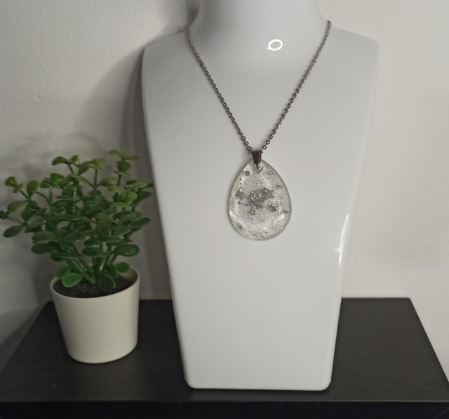 Pendentif éclat d&#039;argenté CO008