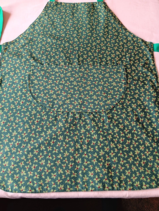 Kitchen Apron Cotton Holly Print Fabric with Green Lining and straps. Adjustable neck tie, lined matching pocket