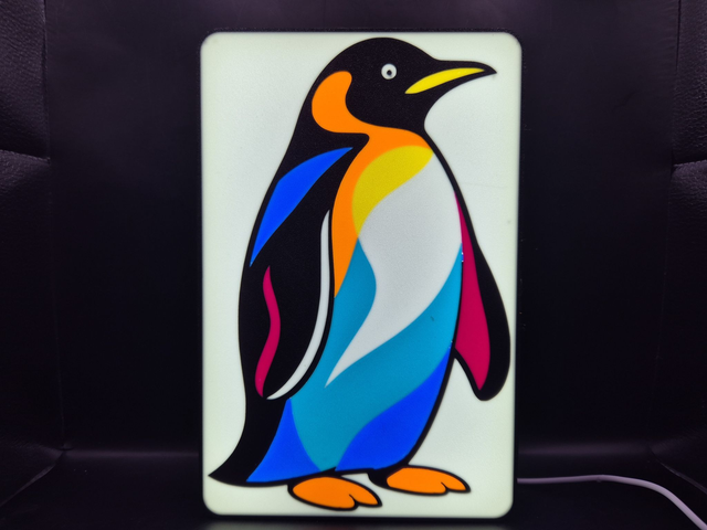 Light Up Sign Of A Colourful Penguin