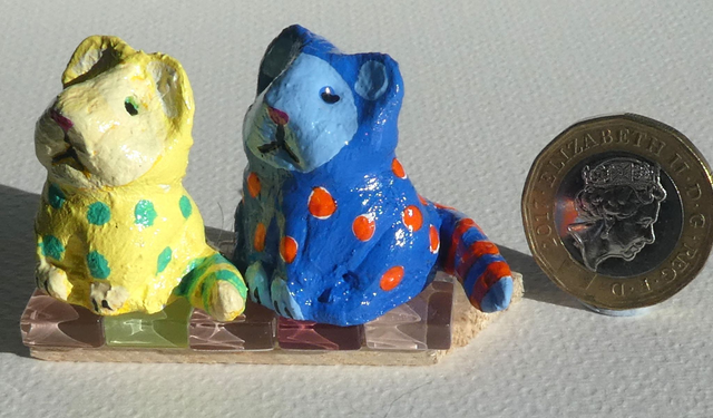 Wonderful Gifts. "Kitties on a Canvas Wedge" are fun handmade gifts. Blue and yellow