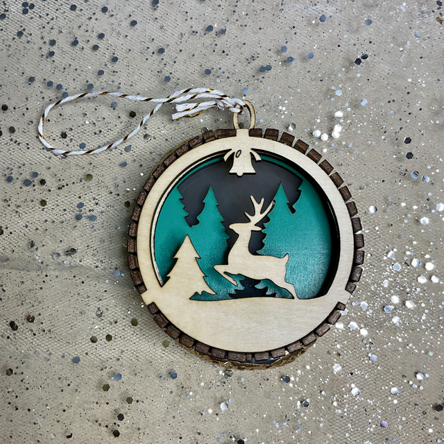 Laser cut Christmas ornament. Wooden .