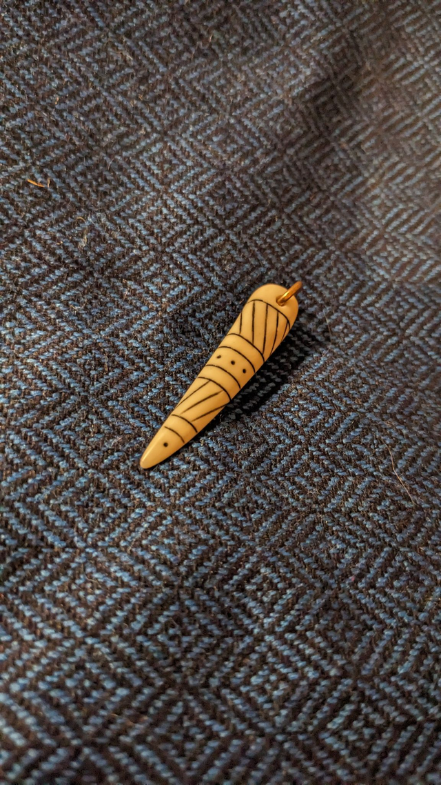 Antler tusk pendant