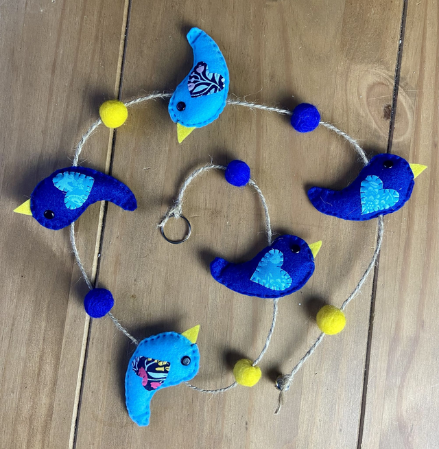 Hanging blue bird decoration.