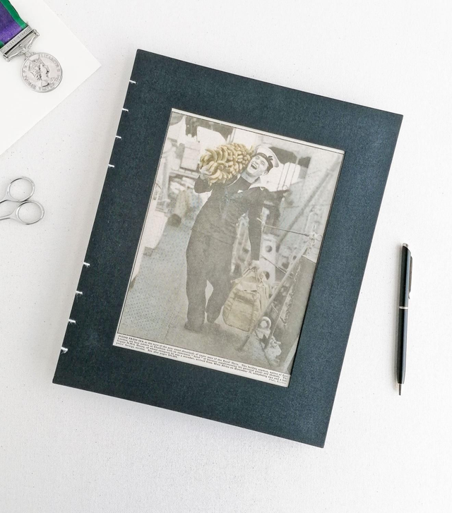 'Sailor and bananas' Large black linen portrait notebook/ scrapbook with plain paper.