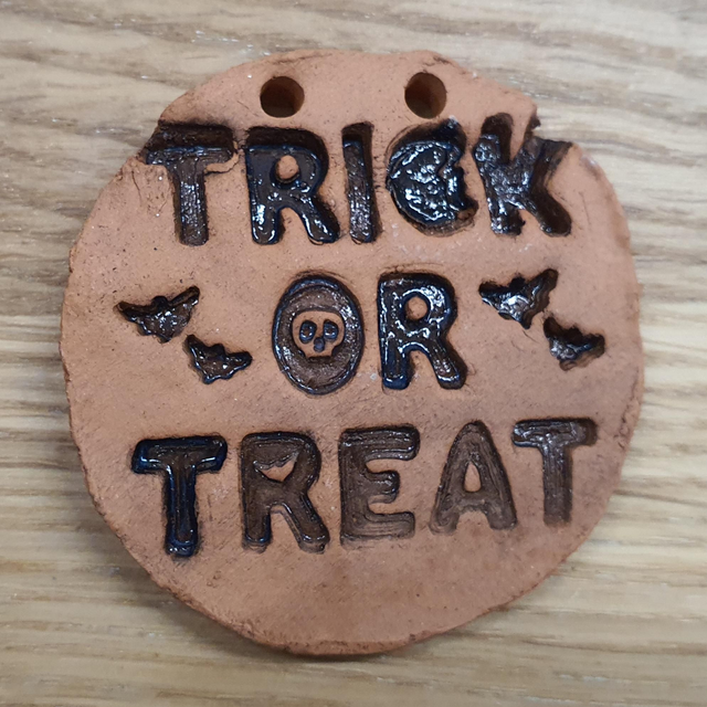 Trick or treat (black glazed) hanging decoration