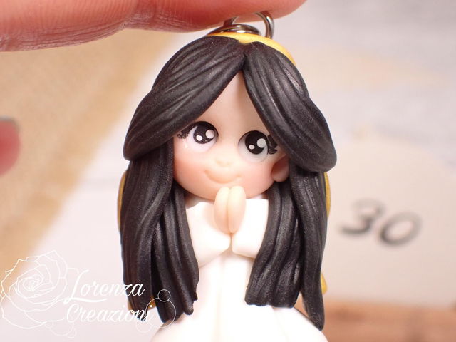 Angioletto custode tascabile n. 30
Portachiavi o charm, artigianale, pezzo unico. Modellato a mano argilla polimerica, made in Italy.
